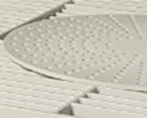 Detail des Drehtischs in einer Druckstrahlkabine für kontrolliertes Werkstückhandling